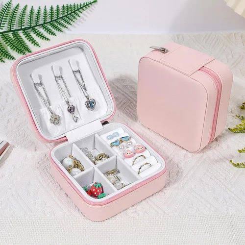 Portable jewelry box organizer, ideal for storing and protecting jewelry, especially while traveling.